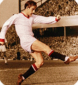 Dennis Viollet wearing the 1956  Manchester United away kit