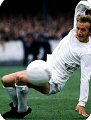 Denis Law wears the all white Manchester United kit 1969