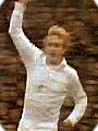 Denis Law celebrates scoring whilst wearing the 1970's Manchester United away kit