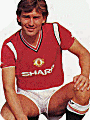 Bryan Robson models the new Adidas kit for 1984
