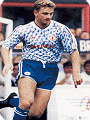 Mark Robins is mad for it in the 1990 Manchester United away strip