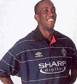 Dwight Yorke in the woolen 1999 Manchester United away strip